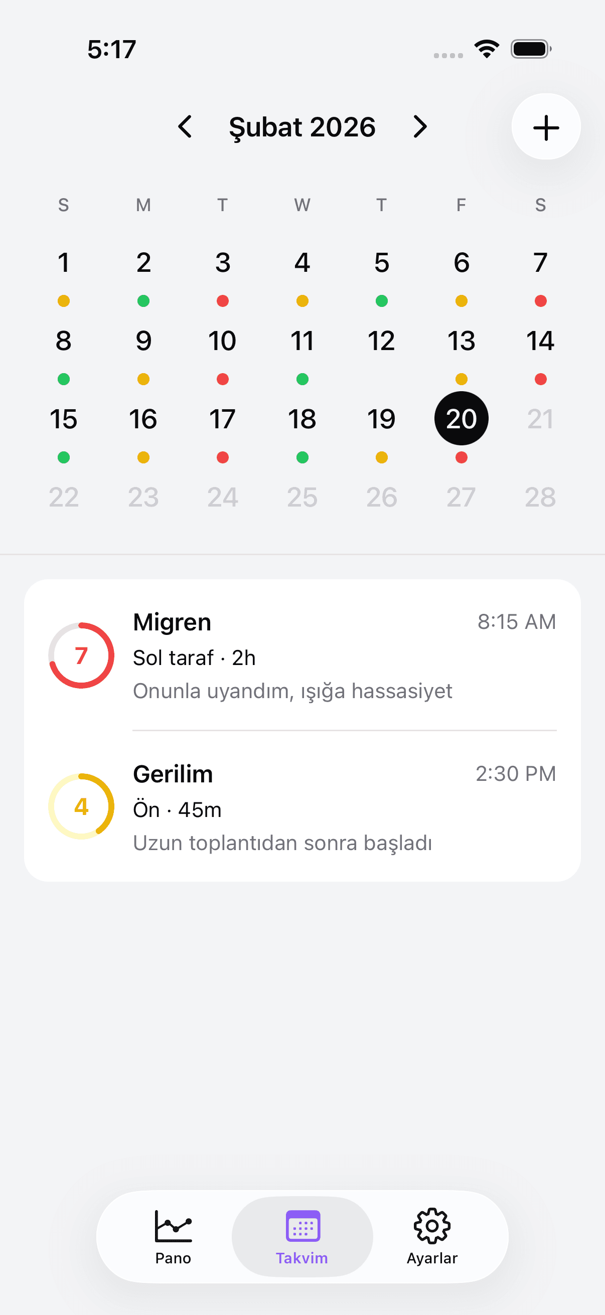 Calendar view with color-coded headache entries
