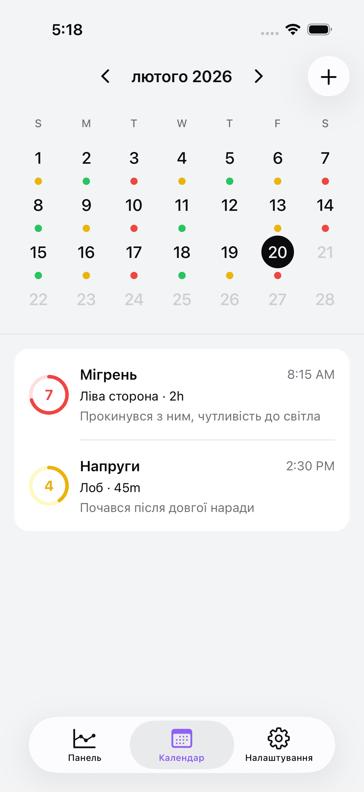 Calendar view with color-coded headache entries